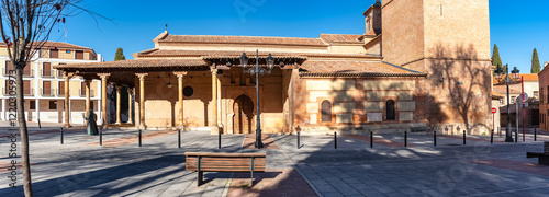 Facade of the co-cathedral of Santa Maria in Mudejar style in the city of Guadalajara, Castilla la Mancha. photo