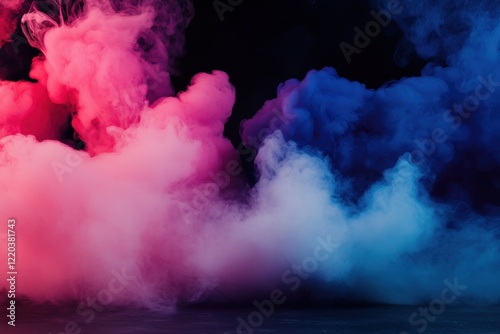 Vibrant clouds of pink and blue smoke swirl against a dark background, creating a dramatic and artistic visual effect.
