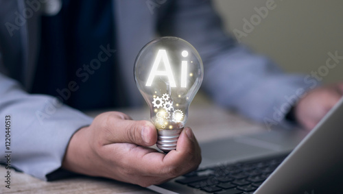 Man's hand with a light bulb And there's a gear icon in there. And he is using a notebook computer. Ideas inspired by online technology Innovative ideas from (AI)