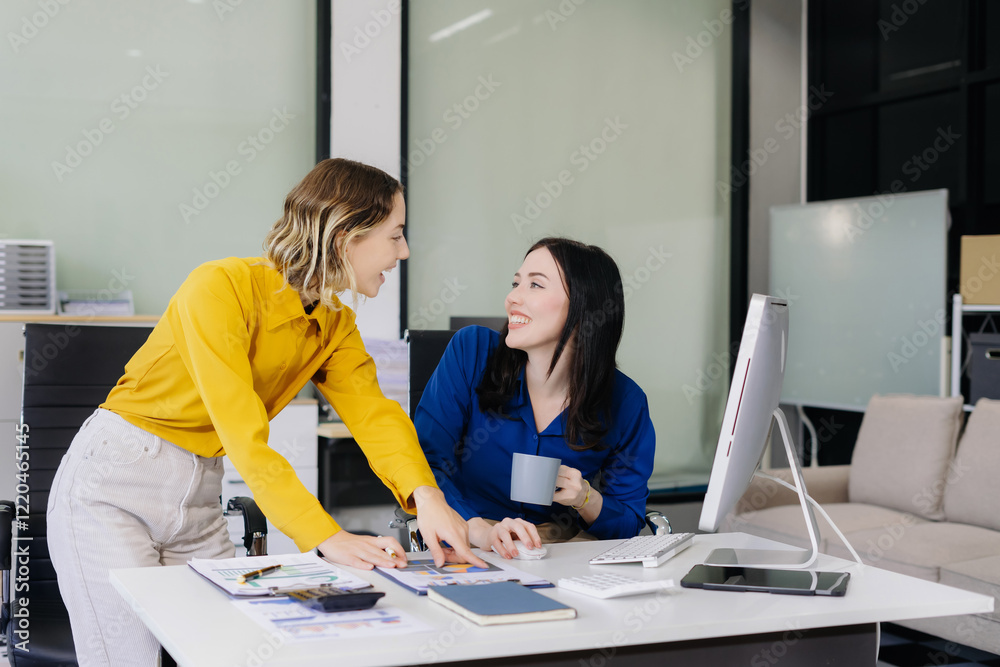 Fototapeta premium Diverse professionals collaborate on project analysis with financial graphs.