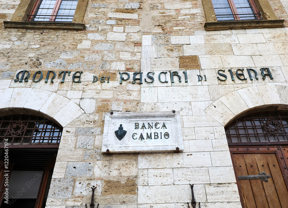 Naklejka premium San Gimignano, SI, Italy - February 19, 2023: branch of the bank called MONTE DEI PASCHI DI SIENA
