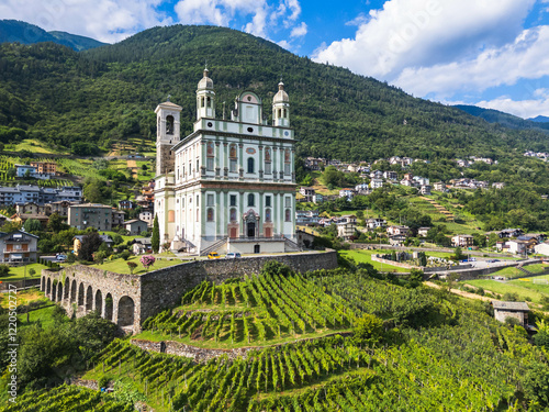 Aerial view of Sanctuary of the Santa Casa Lauretana surrounded by vineyards, Tresivio, Valtellina, Lombardy, Italy
