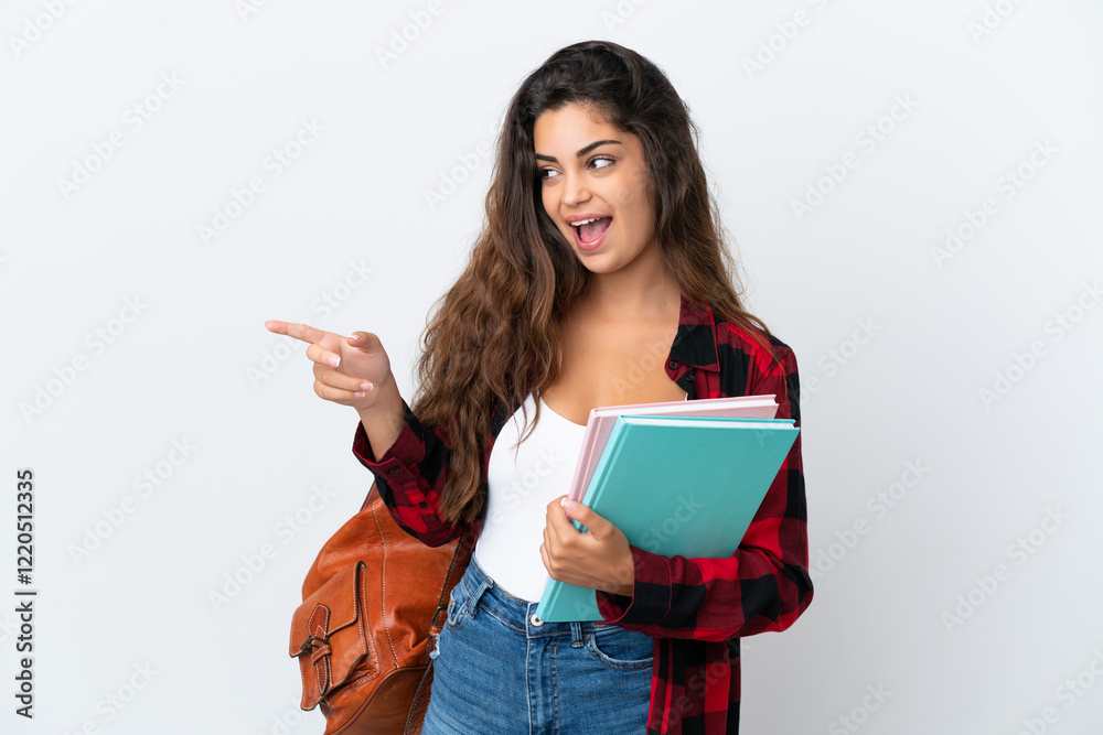 Young student woman isolated on white background pointing finger to the side and presenting a product Young student woman isolated on white background pointing finger to the side and presenting a product