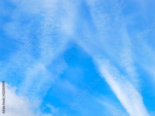 Contrails against a Clear Blue Winter Sky