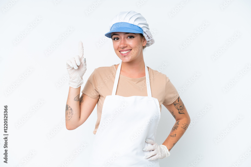 Fishmonger wearing an apron and holding a raw fish isolated on white background pointing up a great idea Fishmonger wearing an apron and holding a raw fish isolated on white background pointing up a great idea