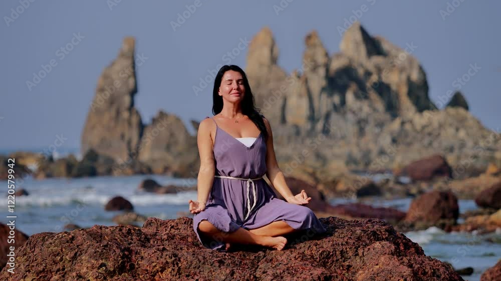 Meditation by the Ocean: Peaceful Yoga on a Rocky Beach Meditation by the Ocean: Peaceful Yoga on a Rocky Beach