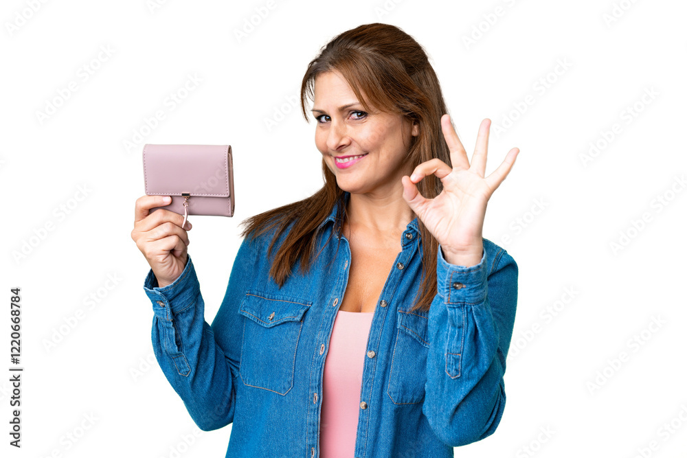 Middle age caucasian woman holding wallet over isolated background showing ok sign with fingers Middle age caucasian woman holding wallet over isolated background showing ok sign with fingers
