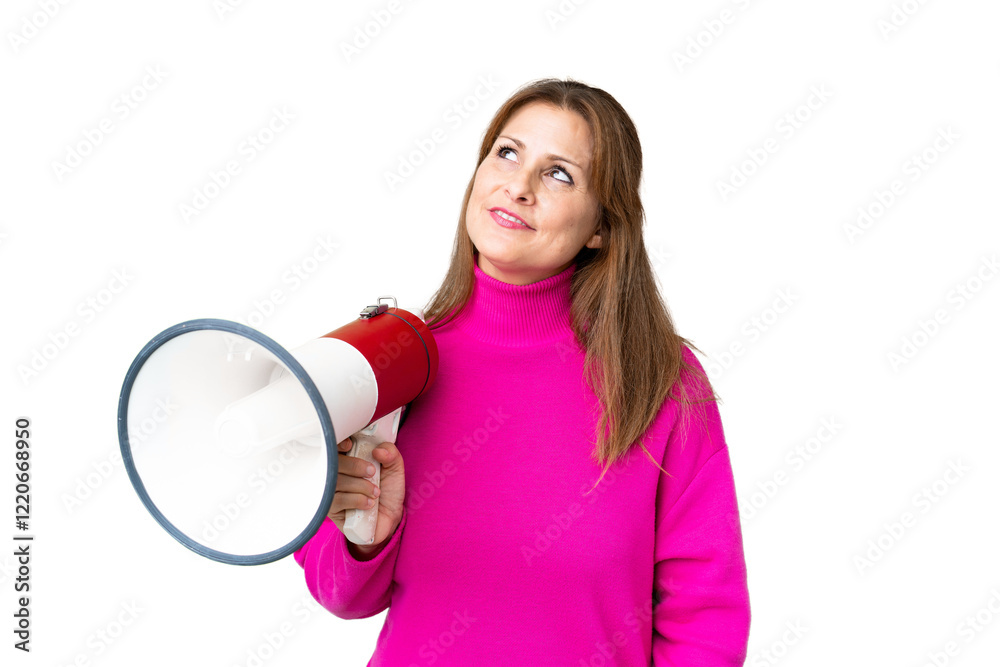 Naklejka premium Middle age woman over isolated background holding a megaphone and looking up while smiling