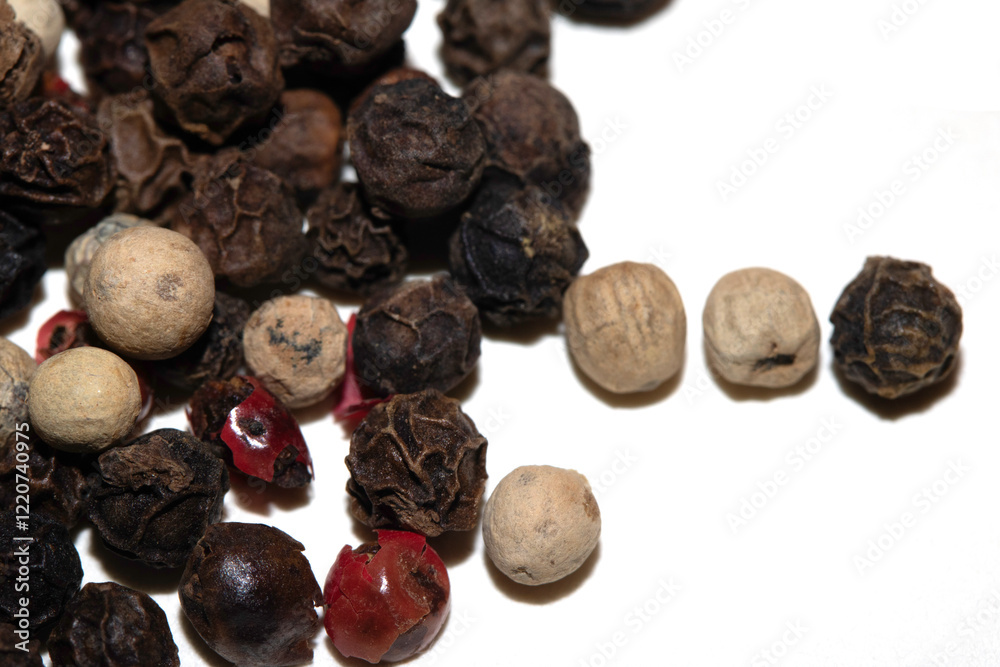 Close up of mixed pepercorn on white background Close up of mixed pepercorn on white background