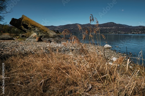 View of the erratic rock of Quassa bay, lake Maggiore in the north Italy photo