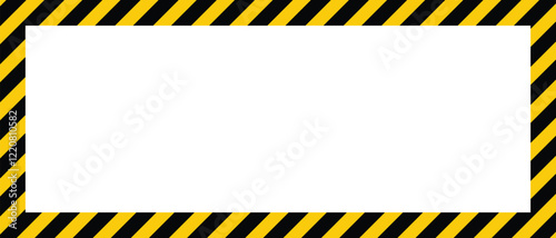 Empty space bordered by a cautionary yellow and black diagonal striped pattern.