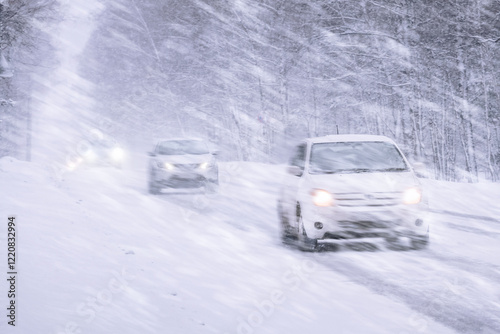 Slika na platnu Winter snowstorm, snowfall and ice on roads with strong winds