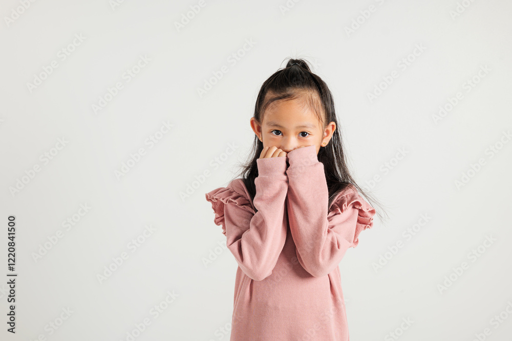 Asian portrait cute young kid girl standing amazed, shocked afraid mouth covered gesturing hand palms looking camera, studio shot isolated on white background, Thai kindergarten child scared Asian portrait cute young kid girl standing amazed, shocked afraid mouth covered gesturing hand palms looking camera, studio shot isolated on white background, Thai kindergarten child scared