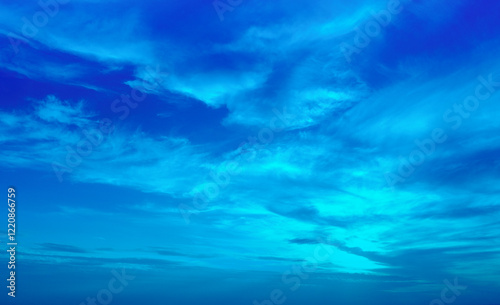 Obraz na płótnie Blue cloudy sky at sunset. Sky texture. Abstract nature background w salonie