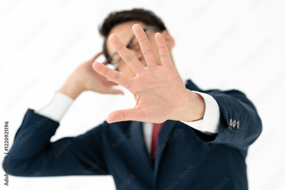 Obraz premium ストップのジェスチャーをする男性