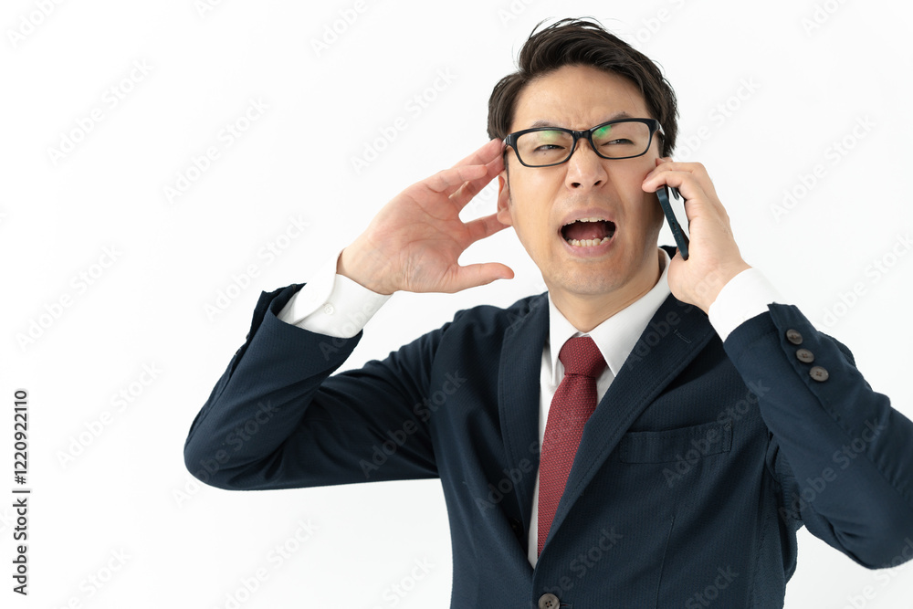 電話をするビジネスマン 電話をするビジネスマン