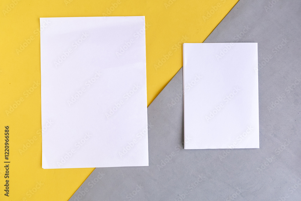 Two white mockup blanks on geometric grey and yellow background, copy space for the text Two white mockup blanks on geometric grey and yellow background, copy space for the text