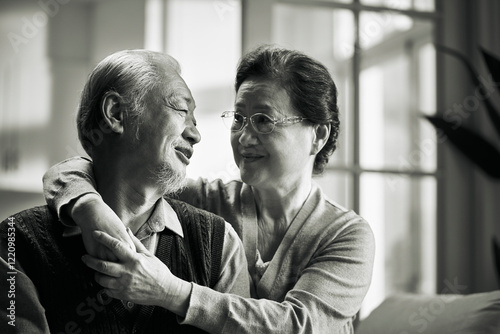 happy senior asian couple chatting conversing at home, black and white
