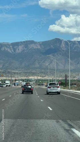 Driving in Albuquerque, New Mexico with view of Sandia Mountains, city dashcam, scenery of the american west