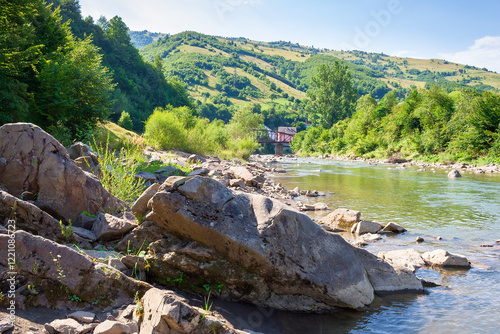 tisza river near rakhiv town. beautiful view. carpathian mountain landscape in summer. place where two stream join. countryside valley photo