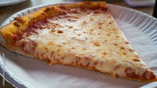 A mouthwatering slice of cheesy pizza, perfect for a satisfying meal. photo