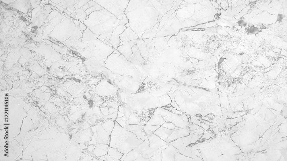 Naklejka premium A white marble wall with cracks and holes. The wall is smooth and shiny, but the cracks and holes give it a rough and aged appearance. The contrast between the smooth surface