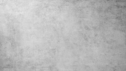 A grey wall with a grey background. The wall is made of concrete and has a rough texture white gray rough texture background as banner