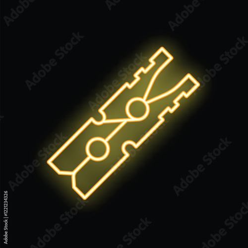 Clothes peg glowing neon sign showing laundry icon on black brick wall