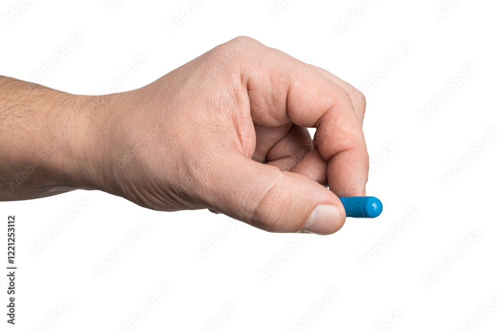 Fototapeta premium Male hand holding blue medicine capsule, antibiotic pill, or painkiller, isolated on transparent background. healthcare and treatment concept