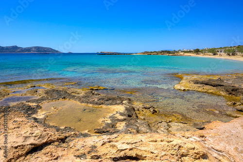 Obraz na płótnie Ano Koufonisi beach with rocks and azure sea water. Small Cyclades, Greece w salonie