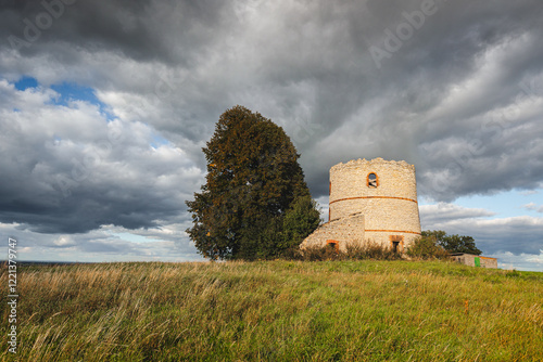 Obraz na płótnie Ruins of windmill on Opolskie Voivodship in autumn day w salonie