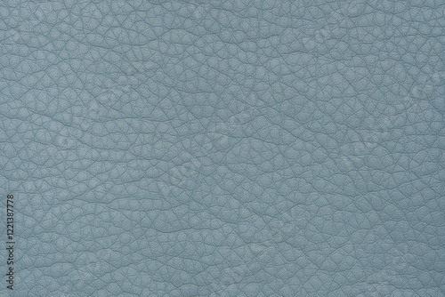 Close up of light blue leather or eco leather texture, ideal for use as a background, material, or design element. photo