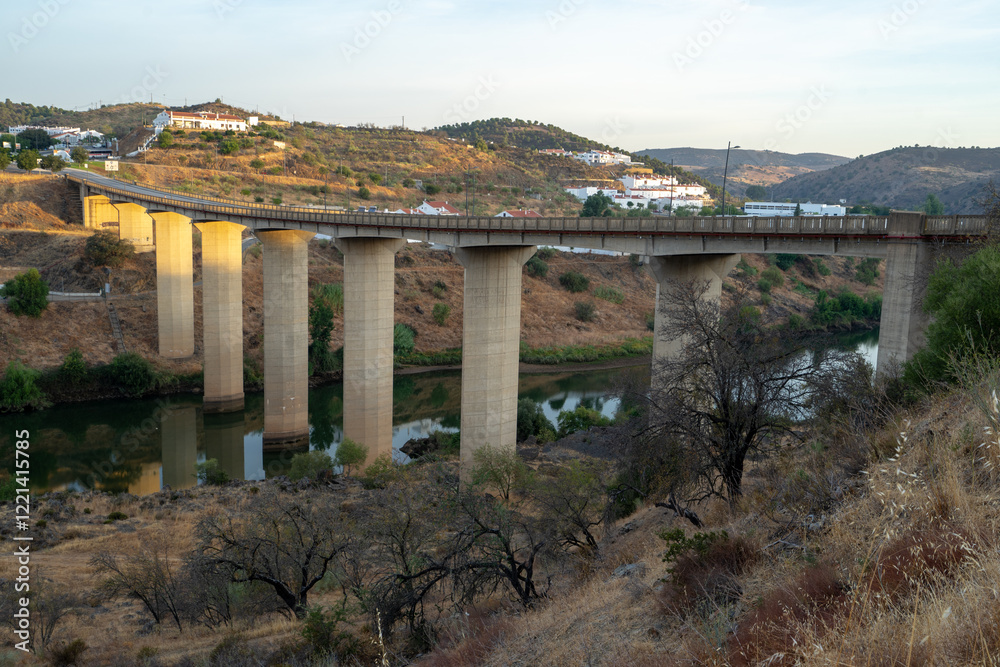 Overlooking the bridge under the Guadiana river in the Alentejo locality of Mertola- Portugal. Overlooking the bridge under the Guadiana river in the Alentejo locality of Mertola- Portugal.