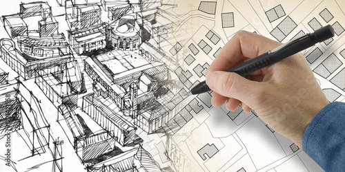 Photography Engineer drawing over an imaginary cadastral map with buildings, land parcel and