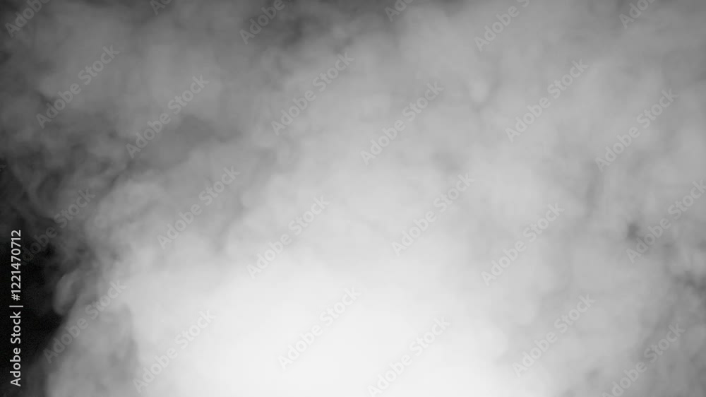 Black and White Smoke Transition. A stream of white smoke emerges from the darkness and moves straight into the camera, completely filling the screen with a white veil