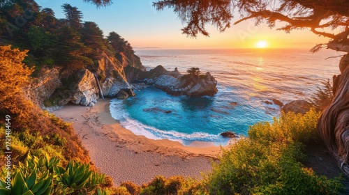 Sunset over mcway falls at big sur coastline with vibrant ocean view
