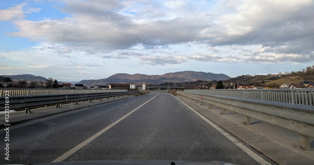 Empty highway road with mountains in background near Krapina, Croatia, Hrvatsko zagorje