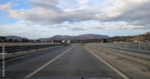 Obraz na płótnie Empty highway road with mountains in background near Krapina, Croatia, Hrvatsko zagorje w salonie