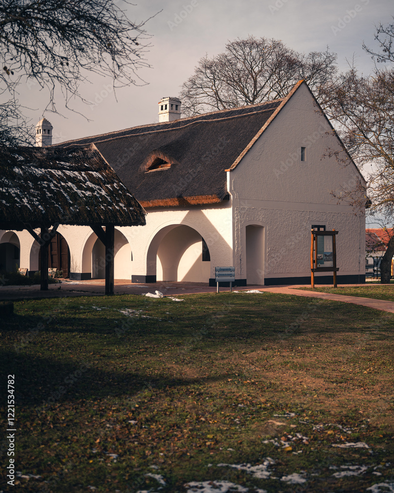 Traditional thatched roof house in Szántódpuszta, Hungary in winter