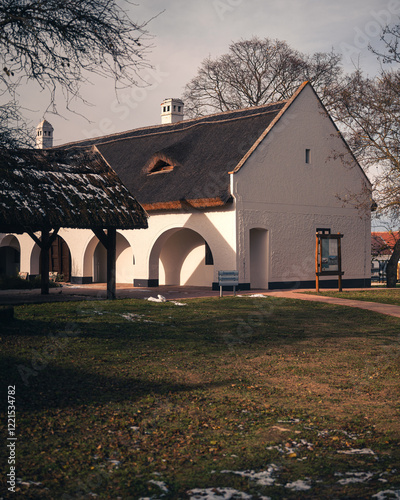Obraz na płótnie Traditional thatched roof house in Szántódpuszta, Hungary in winter w salonie
