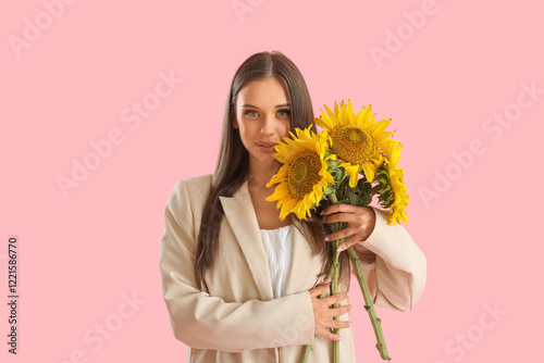 Young woman with bouquet of...