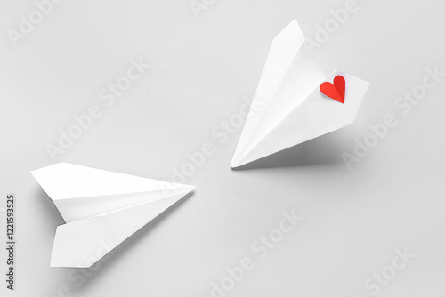 Paper planes and red heart ...