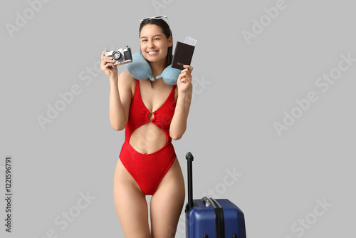 Young happy woman in swimsu...