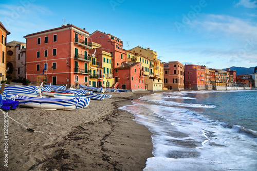 Fototapeta Naklejka Na Ścianę i Meble -  A sand beach in the colorful Sestri Levante town on mediterranean coast of Ligury, Italy