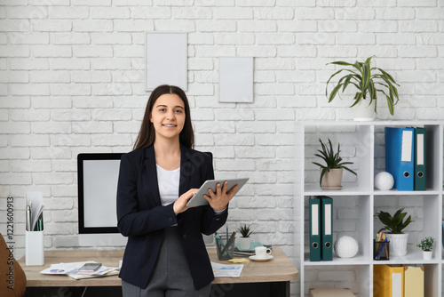 Female office worker using ...