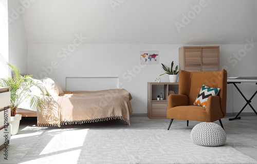 Bright modern attic bedroom...
