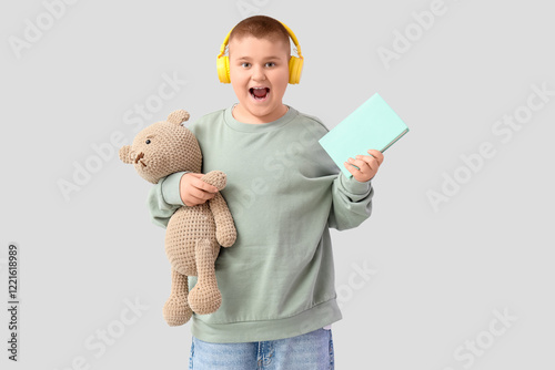 Happy boy with headphones a...