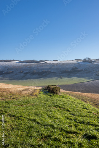 Farmland in Sussex with a dusting of snow on the South Downs hills photo