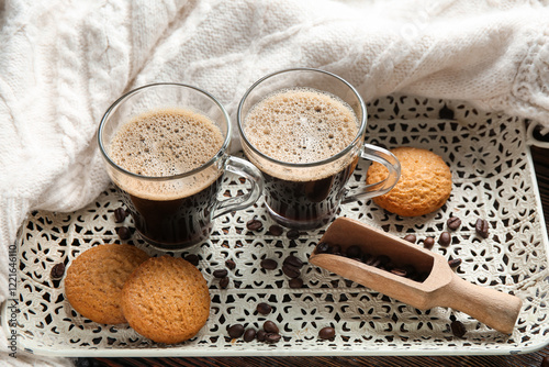 Two glass mugs of hot coffe...