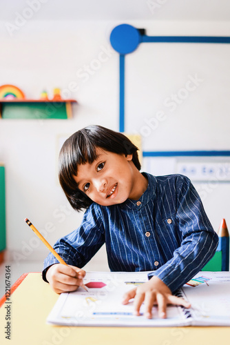School children, Asian kid having fun at kindergarten room doing homework. Education concept